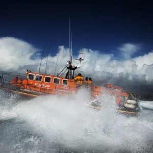 Baltimore Tyne class lifeboat Hilda Jarrett 47-024 moving from right to left, lots of white spray