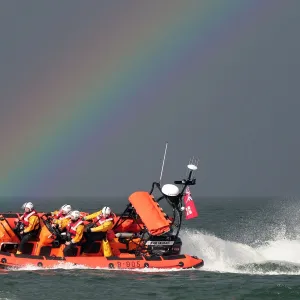 Bangor Atlantic 85 Jessie Hillyard in front of a rainbow