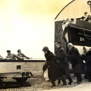 Black and white photo of the lady launchers hauling the Dungeness lifeboat