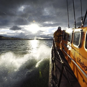 Crew member on board the Wicklow Tyne class lifeboat Annie Blaker 47-035, lots of water spray