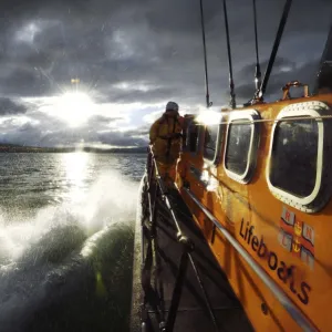 Crew member on board the Wicklow Tyne class lifeboat Annie Blaker 47-035, lots of water spray