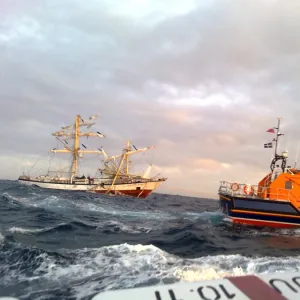 Dismasted Polish sail training vessel Fryderyk Chopin under tow