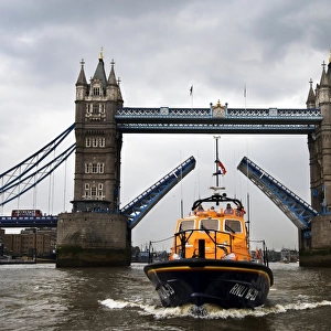 Eastbourne Tamar class lifeboat the Diamond Jubilee 16-23 on the Thames as part of the Queens Diamond Jubilee Pageant. Tower Bridge in the background