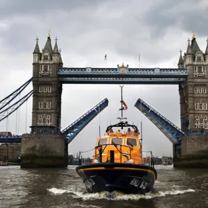 Eastbourne Tamar class lifeboat the Diamond Jubilee 16-23 on the Thames as part of the Queens Diamond Jubilee Pageant. Tower Bridge in the background