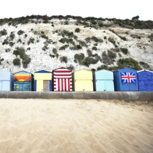 Landscape shot of the colourful beach huts at Broadstairs