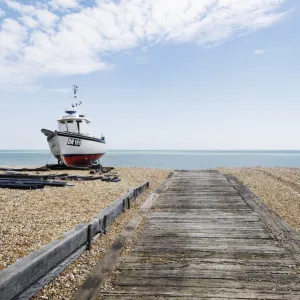 Landscape shot of fishing vessel sat on Walmer beach