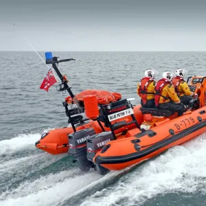 Littlehampton Atlantic 75 Blue Peter I B-779. Three crew on board, lifeboat moving from left to right