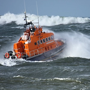 Portrush trent class lifeboat Dora Foster Mcdougall 14-24 moving from left to right in heavy seas, lots of white water