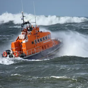 Portrush trent class lifeboat Dora Foster Mcdougall 14-24 moving from left to right in heavy seas, lots of white water