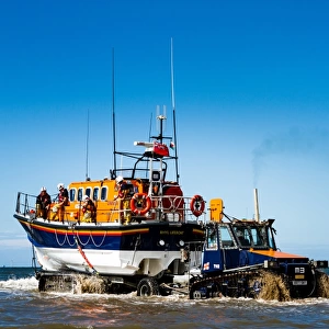 Rhyl Mersey class lifeboat Lil Cunningham 12-24 being launched by tractor