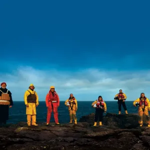 RNLI lifejackets through the ages photo used in Lifeboat magazine Spring 2012. Photo shows the evolution of lifejackets used by the RNLI. From left to right: cork, kapok, beaufort, old ALB, old ILB, new ILB, new ALB