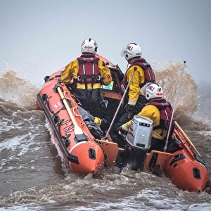 Skegness D-class inshore lifeboat Marie Theresa Bertha Barrass D-792 being launched through surf on a training exercise