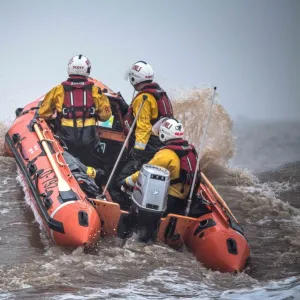 Skegness D-class inshore lifeboat Marie Theresa Bertha Barrass D-792 being launched through surf on a training exercise