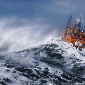 St Davids Tyne class lifeboat Garside 47-026 in rough seas. Three crew can be seen at the upper steering position. Lifeboat is partially obscured by a large wave and lots of white water