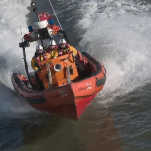 Tower Pier E class lifeboat powering along theThames at high spe