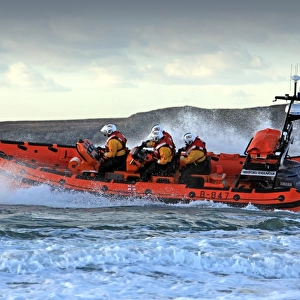 Trearddur Bay Atlantic 85 inshore lifeboat Hereford Endeavour B-847. Lifeboat moving from right to left at speed, foud crew on board