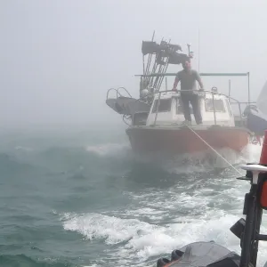 Vessel being towed by the Rye Harbour inshore lifeboat