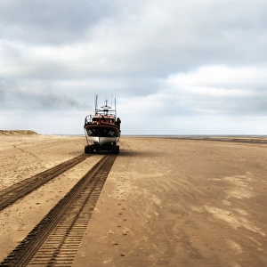 Wells Mersey class lifeboat Doris M Mann of Ampthill 12-003 being launched by carriage along the beach