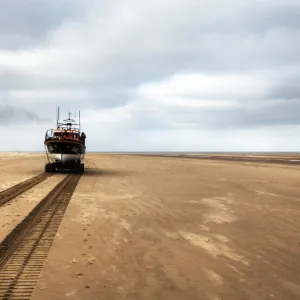 Wells Mersey class lifeboat Doris M Mann of Ampthill 12-003 being launched by carriage along the beach