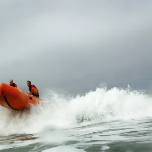 Woolacombe. RNLI lifeguards in an iArancia nshore rescue boat