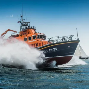 Yarmouth Severn class lifeboat Eric and Susan Hiscock (Wanderer) 17-25 providing safety cover during the Round the Island Race 2016. Sailing yachts, offshore, leisure, coastal safey