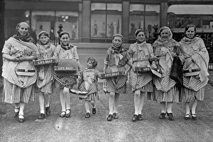 3 ladies and 5 children all with RNLI collection boxes possibly