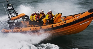 Atlantic 85 inshore lifeboat Harold Baines B-840 during a training exercise in Poole bay. Crew wearing new lifejackets Atlantic 85 inshore lifeboat Harold Baines B-840 during a training exercise in Poole bay. Crew wearing new lifejackets