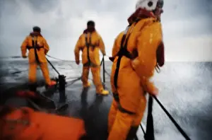 Crew members stood on the fore deck of the Hoylake lifeboat Lady of Hilbre
