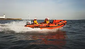 Inshore Lifeboat Prints: Exercise between Scarborough D-class inshore lifeboat and lifeguards