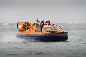 Hunstanton hovercraft The Hunstanton Flyer H-003 heading from left to right at speed, four crew on board