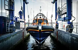 Launch of the first Shannon class lifeboat built at the All-Weather Lifeboat Centre (ALC) in Poole. The ceremonial bell was rung 8 times as the lifeboat Cosandra 13-12 was lowered into the water
