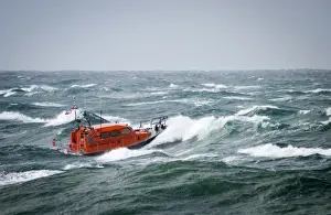 Prototype Shannon class FCB2 lifeboat in rough seas off Portland Bill