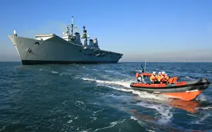Inshore Lifeboat Prints: The Royal Navy flagship aircraft carrier HMS Ark Royal in Poole