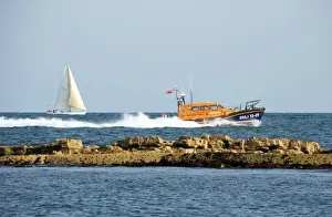 The Shannon class lifeboat RNLB Jock and Annie Slater 13-01 at Swanage to launch the stations fundraising appeal. Lifeboat moving from left to right at speed