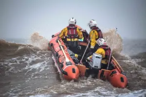 Skegness D-class inshore lifeboat Marie Theresa Bertha Barrass D-792 being launched through surf on a training exercise