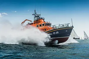 Yarmouth Severn class lifeboat Eric and Susan Hiscock (Wanderer) 17-25 providing safety cover during the Round the Island Race 2016. Sailing yachts, offshore, leisure, coastal safey